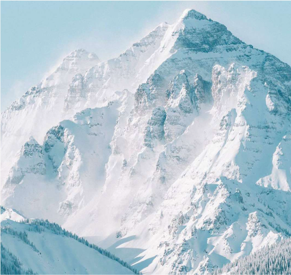 The snow-covered Maroon Bells, inspiration for the St. Regis Aspen puffer lining