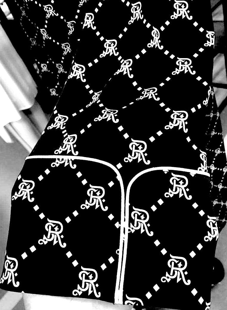 French-cuff detail in black St. Regis Aspen patterned silk